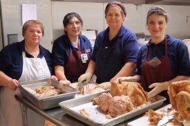 ALF kitchen staff prepares turkeys for local fire station